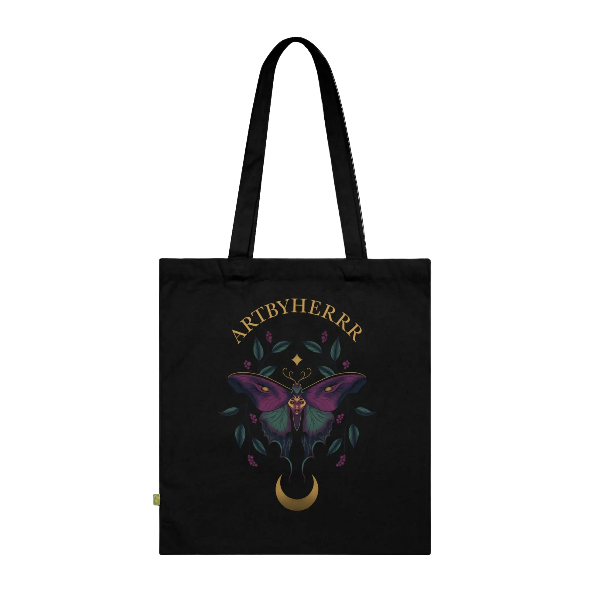Black tote bag with a butterfly design and 'ARTBYHERRR' branding on a black background
